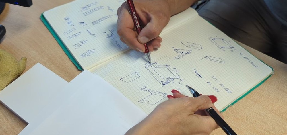 Collaborating with clients through hand-drawn sketches.
